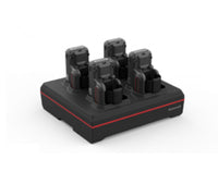 4 bay 8675i device charger with power supply. Charges complete 8675i unit with battery installed. Region-specific cord must be ordered separately